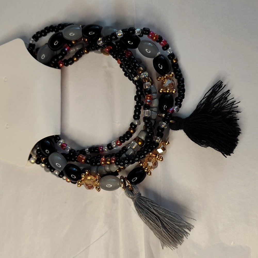 2/$15 NWT 6 Pc Bundle of Beaded Stretch Bracelets with Tassels Black Grey Gold